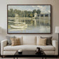 The Bridge at Argenteuil, 1874 by Claude Monet displayed in a walnut floater framed canvas above a sofa in a clean living room.