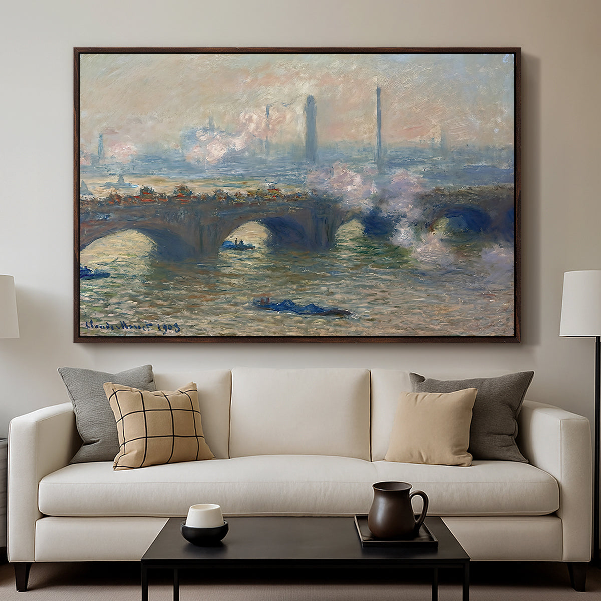 Waterloo Bridge, Gray Day, 1903 by Claude Monet displayed in a walnut floater framed canvas above a sofa in a clean living room.