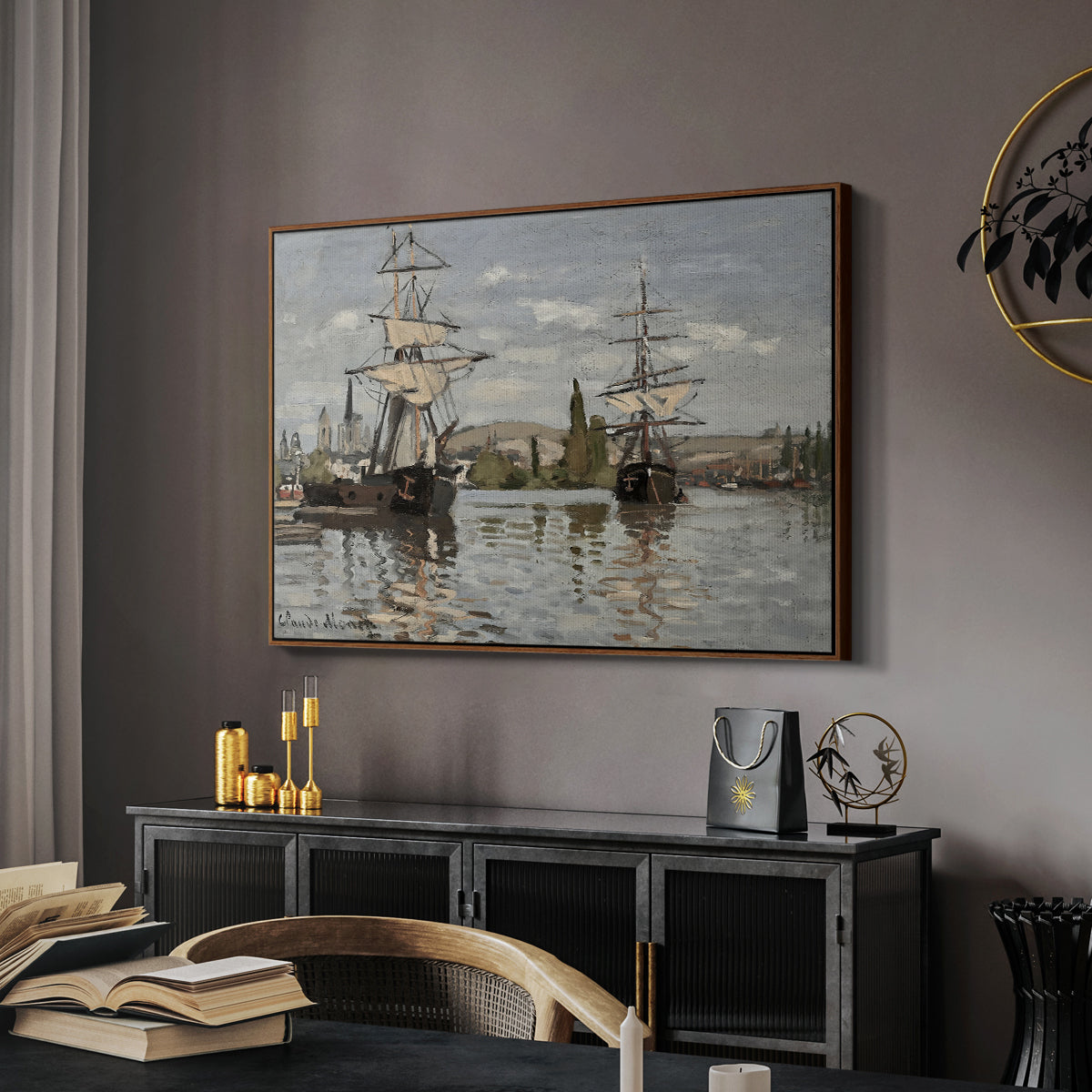 Ships Riding on the Seine at Rouen, 1872 by Claude Monet in a walnut floater framed canvas featuring a harbor view with tall ships lining the waterfront in muted tones, displayed above a desk in a dark home office interior.