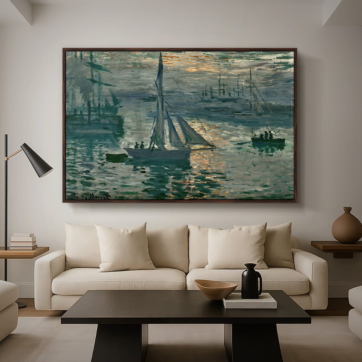 Sunrise (Marine), 1873 by Claude Monet as a walnut floater framed canvas featuring a hazy sunrise over harbor with boats silhouetted in soft morning light, displayed above a sofa in a modern living room.