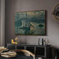 Sunrise (Marine), 1873 by Claude Monet in a walnut floater framed canvas featuring an early morning harbor scene with boats and diffused light, displayed above a desk in a dark home office interior.