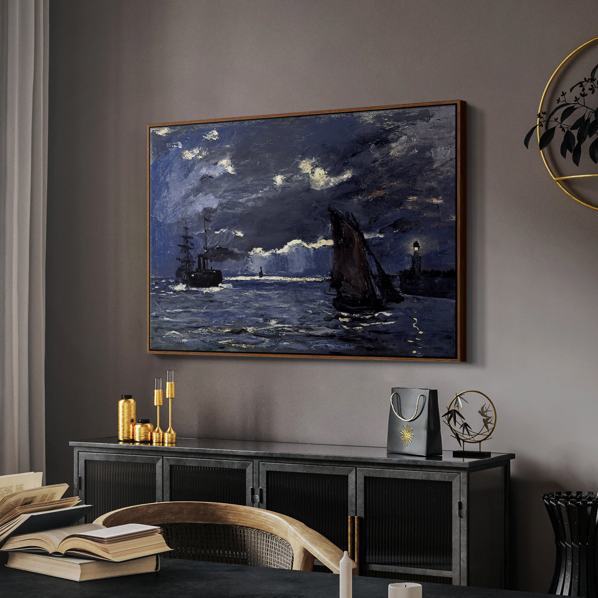 A Seascape, Shipping by Moonlight, 1864 by Claude Monet in a walnut floater framed canvas featuring a dramatic ocean scene with light reflecting across water at night, displayed above a desk in a dark home office interior.