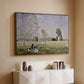 Walnut floater framed canvas of Summer (L'ete), 1874 by Claude Monet, featuring an impressionist countryside scene with figure resting in shade above a console cabinet in a minimalist entryway.