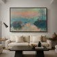 Sunset on the Seine at Lavacourt, Winter Effect, 1880 by Claude Monet as a walnut floater framed canvas featuring a glowing sunset over snowy river landscape with soft reflections, displayed above a sofa in a modern living room.