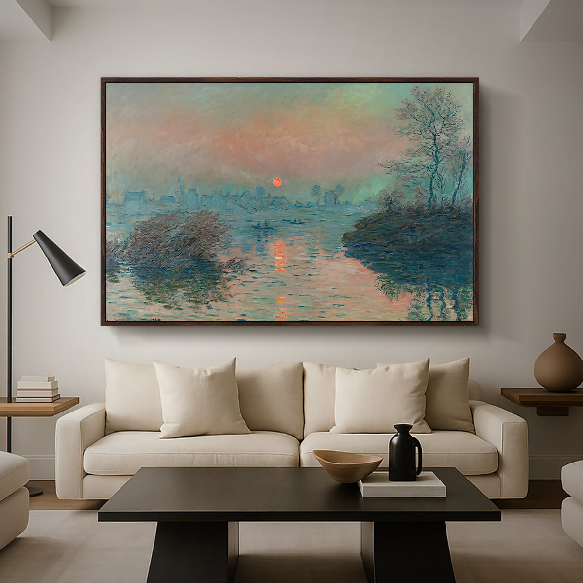 Sunset on the Seine at Lavacourt, Winter Effect, 1880 by Claude Monet as a walnut floater framed canvas featuring a glowing sunset over snowy river landscape with soft reflections, displayed above a sofa in a modern living room.