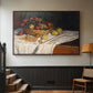 Walnut floater framed canvas featuring a tabletop composition with fruit and subtle shadows, displayed in a hallway near a staircase.
