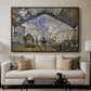 The Gare Saint-Lazare, 1877 by Claude Monet displayed in a walnut floater framed canvas above a sofa in a clean living room.