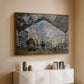 Walnut floater framed canvas of The Gare Saint-Lazare, 1877 by Claude Monet, featuring an impressionist scene of trains and smoke inside busy railway station above a console cabinet in a minimalist entryway.