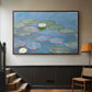 Walnut floater framed canvas featuring a close-up of aquatic plants in still water, displayed in a hallway near a staircase.