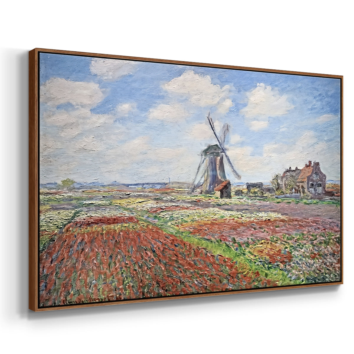Angled view of Tulip Fields with the Rijnsburg Windmill, 1886 by Claude Monet in a walnut floater framed canvas.