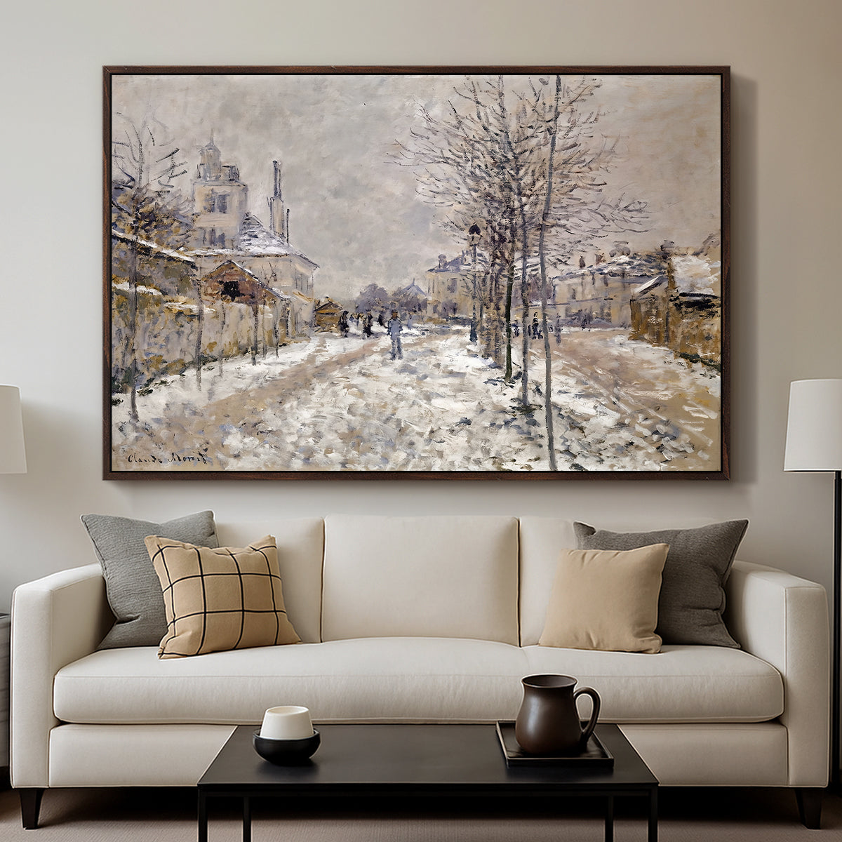 The Boulevard de Pontoise at Argenteuil, Snow Effect, 1875 by Claude Monet displayed in a walnut floater framed canvas above a sofa in a clean living room.