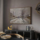 The Boulevard de Pontoise at Argenteuil, Snow Effect, 1875 by Claude Monet in a walnut floater framed canvas featuring a quiet boulevard blanketed in snow with distant figures, displayed above a desk in a dark home office interior.