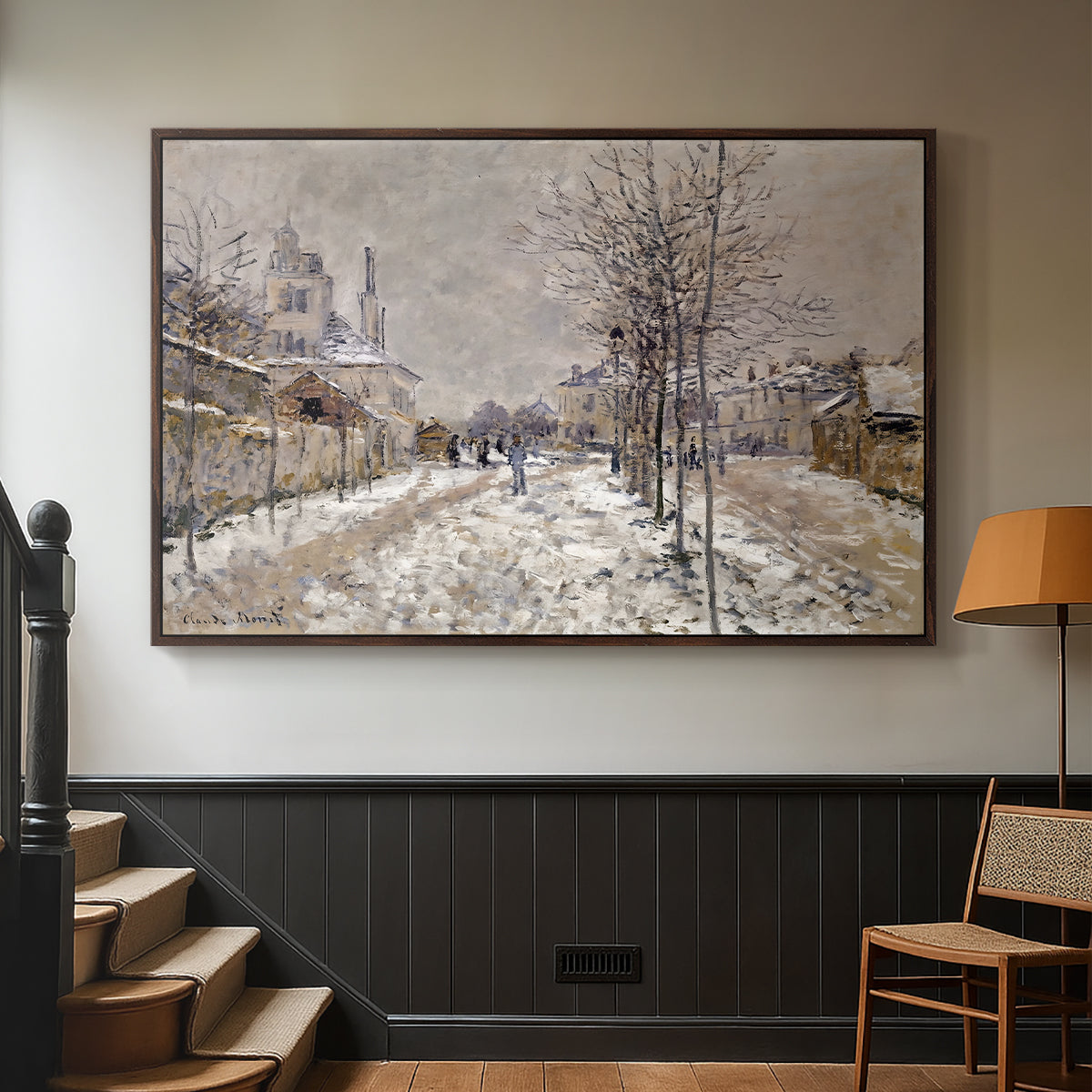 Walnut floater framed canvas featuring an urban winter landscape with muted tones and soft light, displayed in a hallway near a staircase.