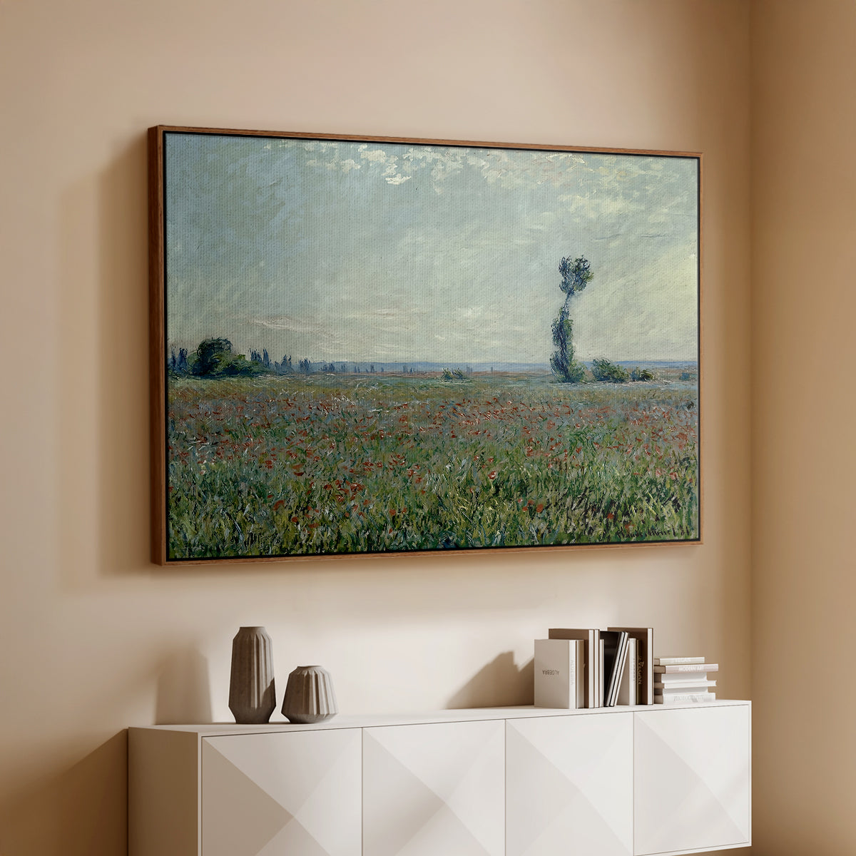 Walnut floater framed canvas of Poppy Field, 1881 by Claude Monet, featuring an impressionist landscape filled with blooming flowers and greenery above a console cabinet in a minimalist entryway.