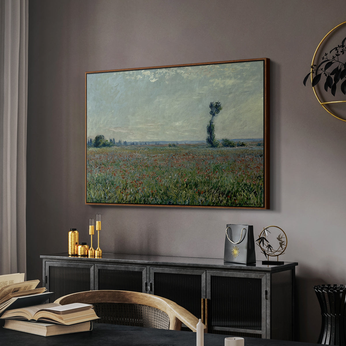 Poppy Field, 1881 by Claude Monet in a walnut floater framed canvas featuring a rural meadow with scattered poppies and soft horizon, displayed above a desk in a dark home office interior.