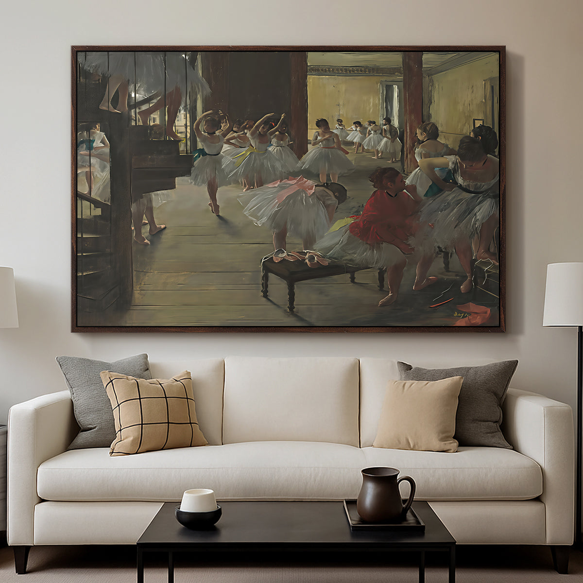 The Dance Class, c. 1873 by Edgar Degas displayed in a walnut floater framed canvas above a sofa in a clean living room.