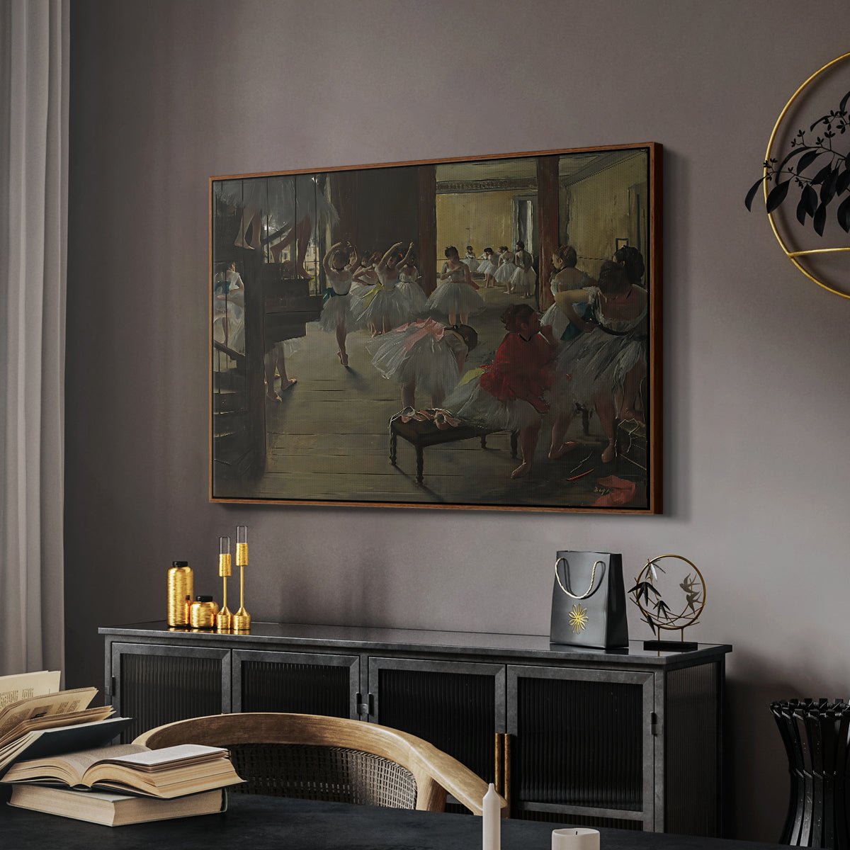 The Dance Class, c. 1873 by Edgar Degas in a walnut floater framed canvas featuring an impressionist studio interior filled with ballet students, displayed above a desk in a dark home office interior.