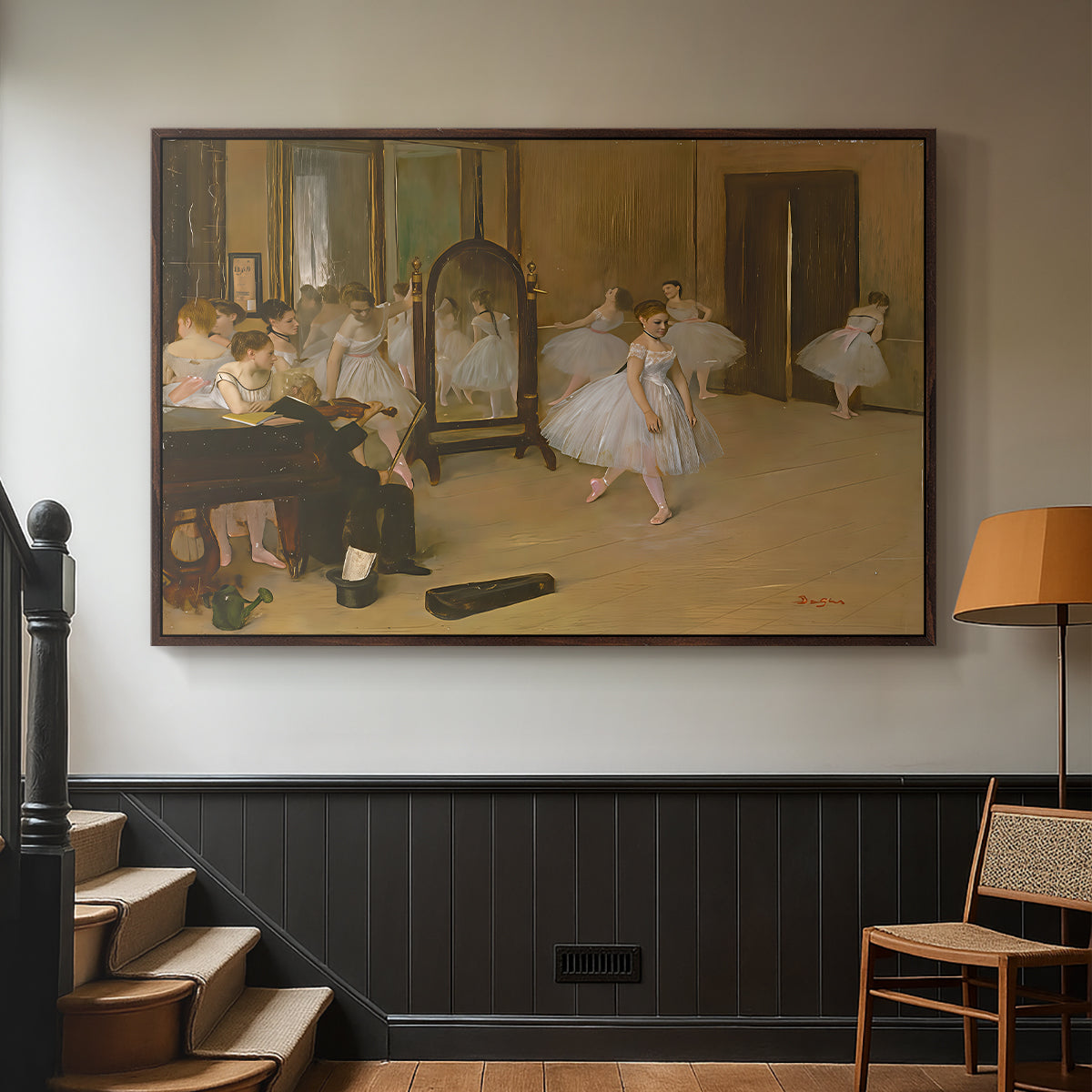 Walnut floater framed canvas featuring a group of dancers mid-practice with teacher overseeing, displayed in a hallway near a staircase.