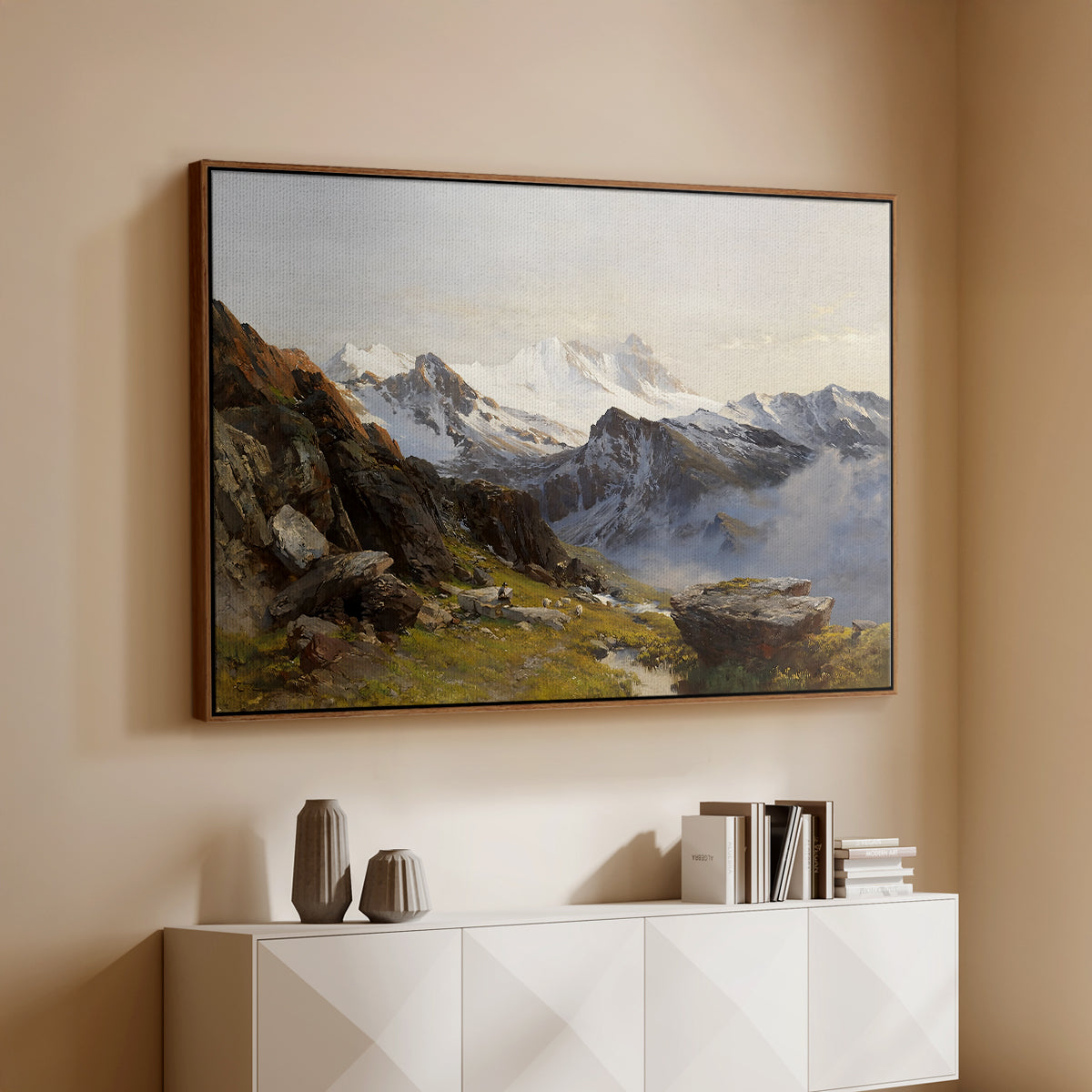 Walnut floater framed canvas of The Großglockner from the Prager Hut, 1890 by Edward Theodore Compton, featuring a mountain summit seen from elevated viewpoint with surrounding landscape above a console cabinet in a minimalist entryway.
