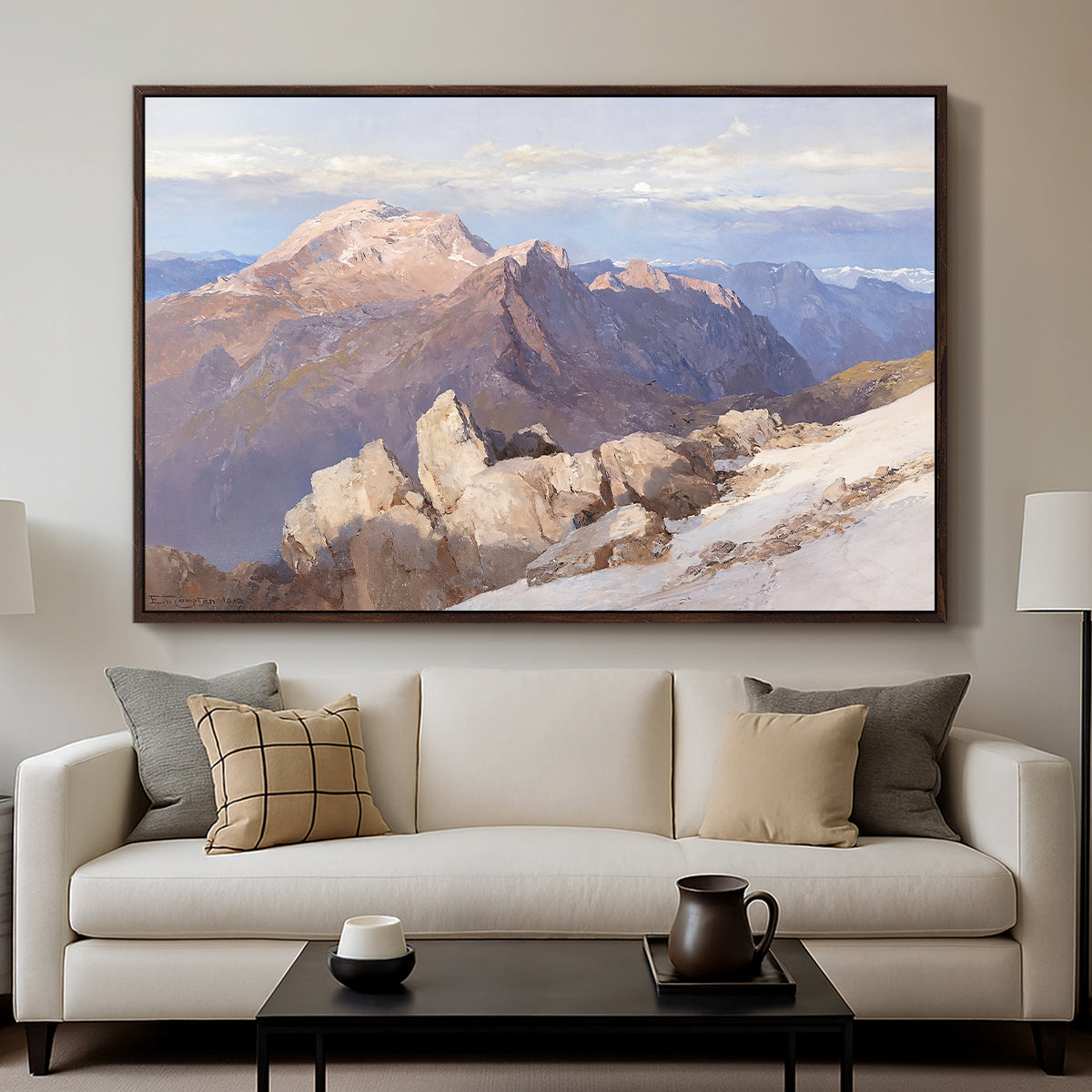 Hoher Göll from Watzmann-Hocheck, 1919 by Edward Theodore Compton displayed in a walnut floater framed canvas above a sofa in a clean living room.