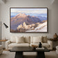 Hoher Göll from Watzmann-Hocheck, 1919 by Edward Theodore Compton as a walnut floater framed canvas featuring a distant mountain peak viewed from elevated ridge with sweeping landscape, displayed above a sofa in a modern living room.