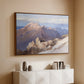 Walnut floater framed canvas of Hoher Göll from Watzmann-Hocheck, 1919 by Edward Theodore Compton, featuring an alpine panorama showing layered peaks and valleys above a console cabinet in a minimalist entryway.