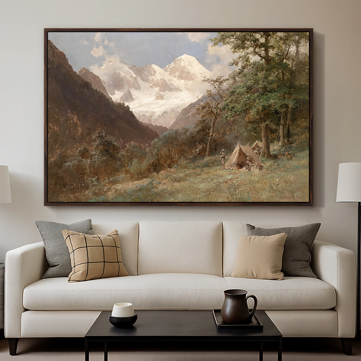 Landscape in the Caucasus, c. 1921 by Edward Theodore Compton displayed in a walnut floater framed canvas above a sofa in a clean living room.