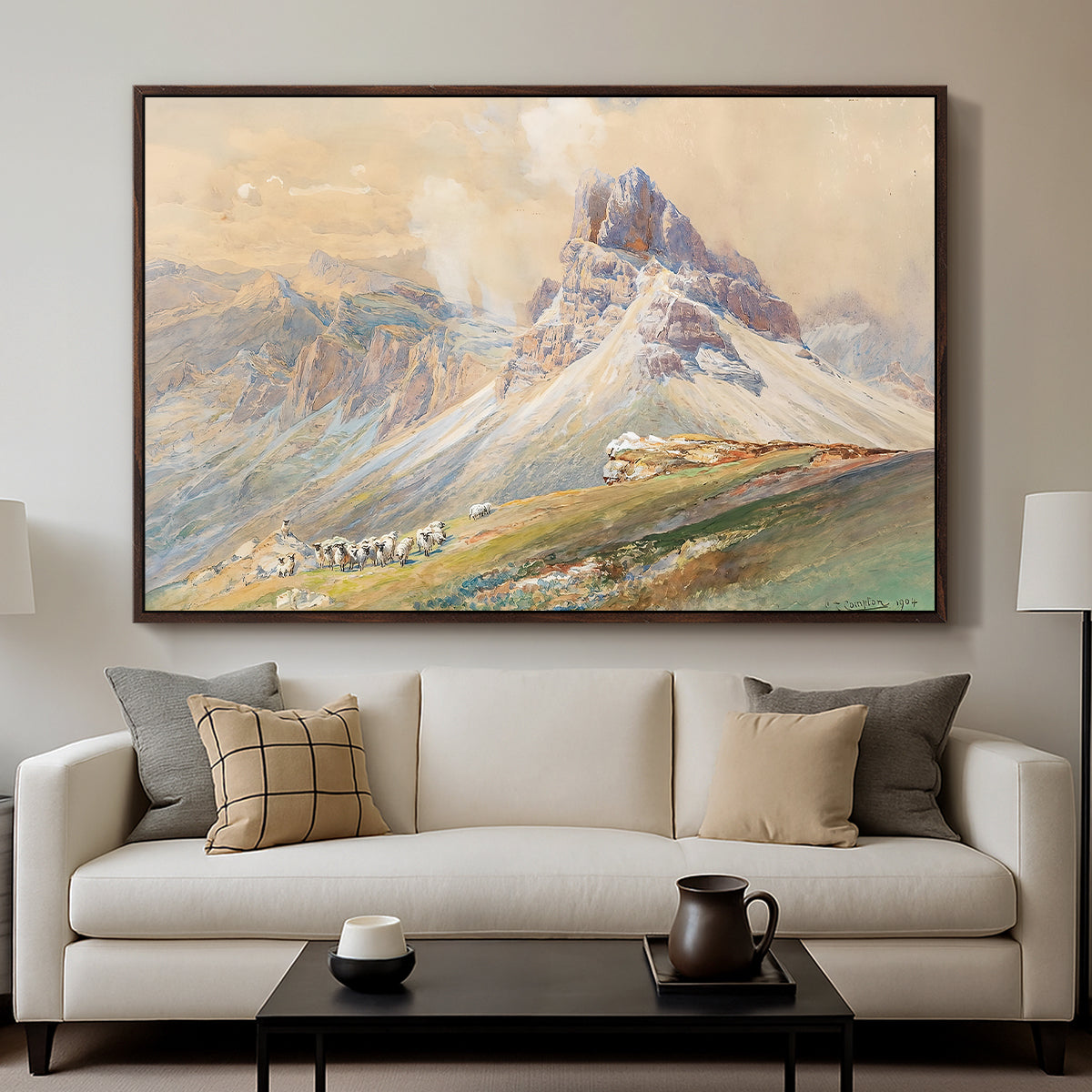 From the Dolomites, 1904 by Edward Theodore Compton displayed in a walnut floater framed canvas above a sofa in a clean living room.
