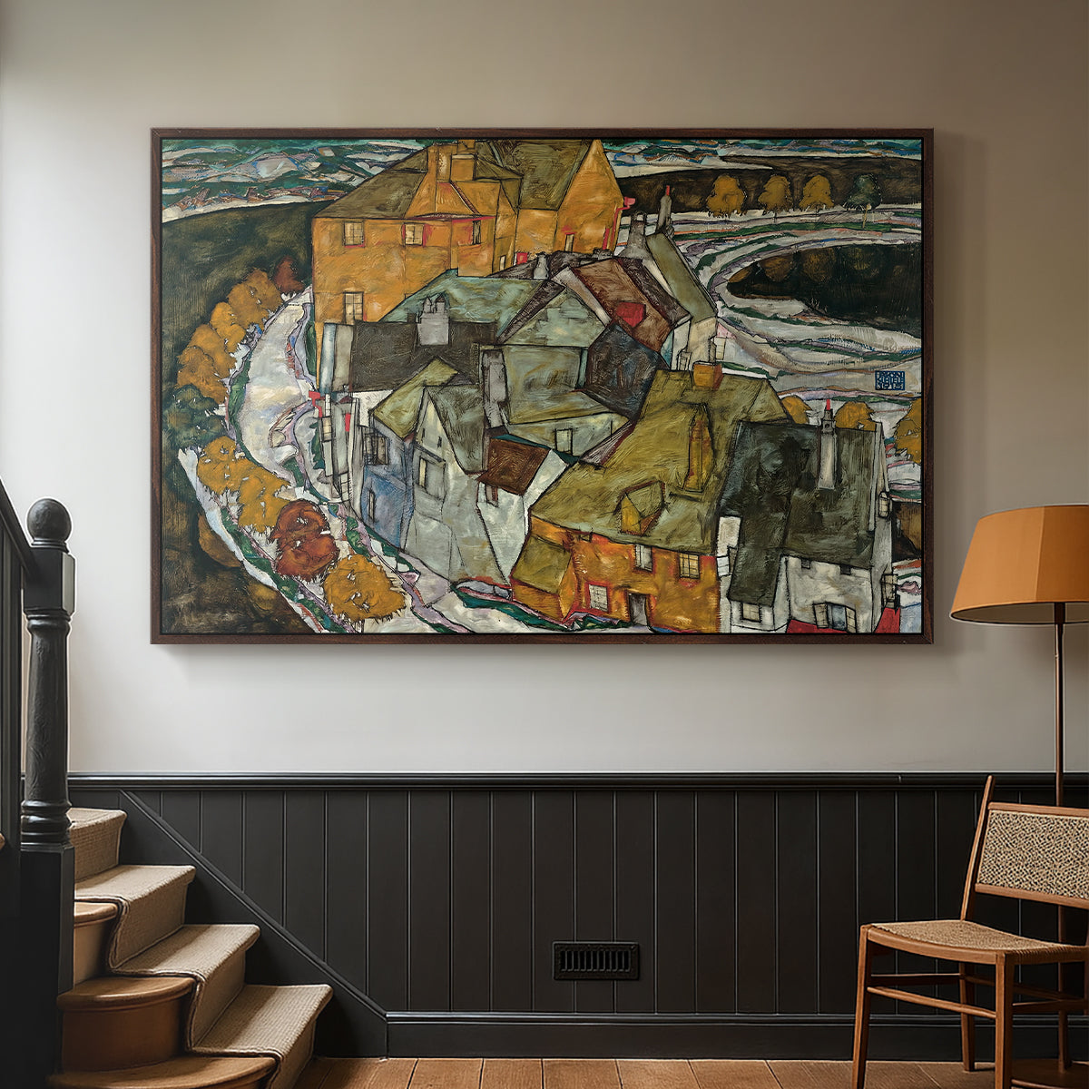 Walnut floater framed canvas featuring an architectural scene with houses arranged in curved composition, displayed in a hallway near a staircase.