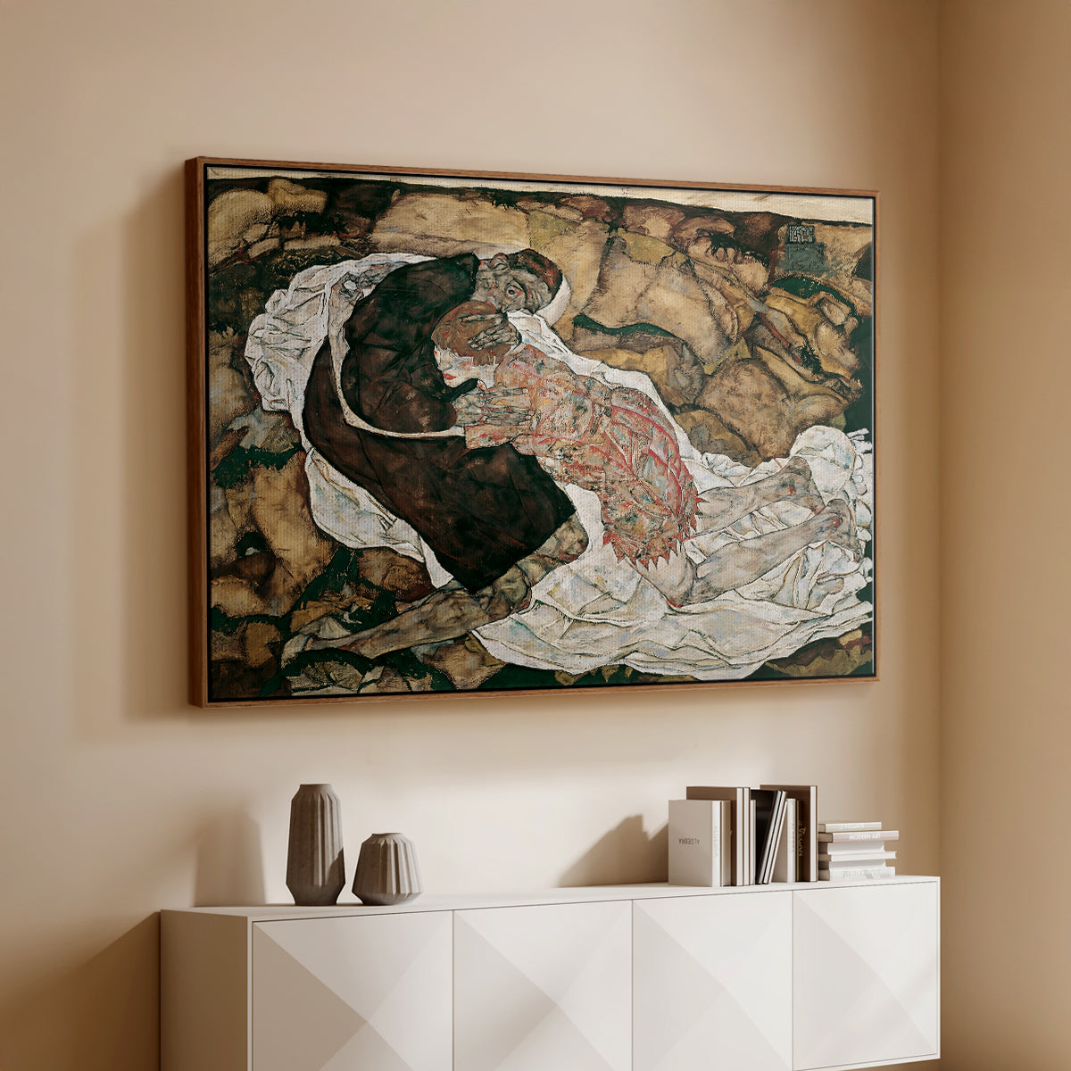 Walnut floater framed canvas of Death and the Maiden, 1915 by Egon Schiele, featuring a symbolic scene of mortality with two figures clinging together above a console cabinet in a minimalist entryway.