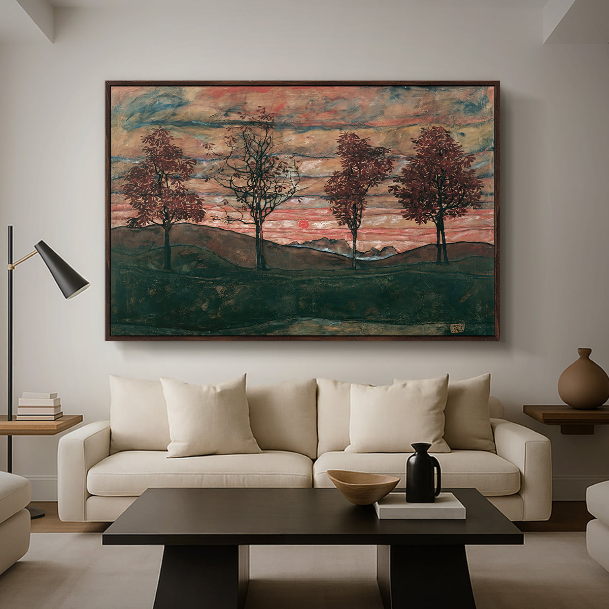 Four Trees, 1917 by Egon Schiele as a walnut floater framed canvas featuring four trees standing in open landscape against colorful sky, displayed above a sofa in a modern living room.