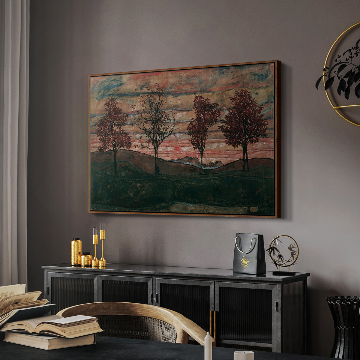 Four Trees, 1917 by Egon Schiele in a walnut floater framed canvas featuring a stylized nature scene with strong outlines and simple composition, displayed above a desk in a dark home office interior.