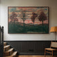 Walnut floater framed canvas featuring an expressionist landscape featuring isolated trees in field, displayed in a hallway near a staircase.