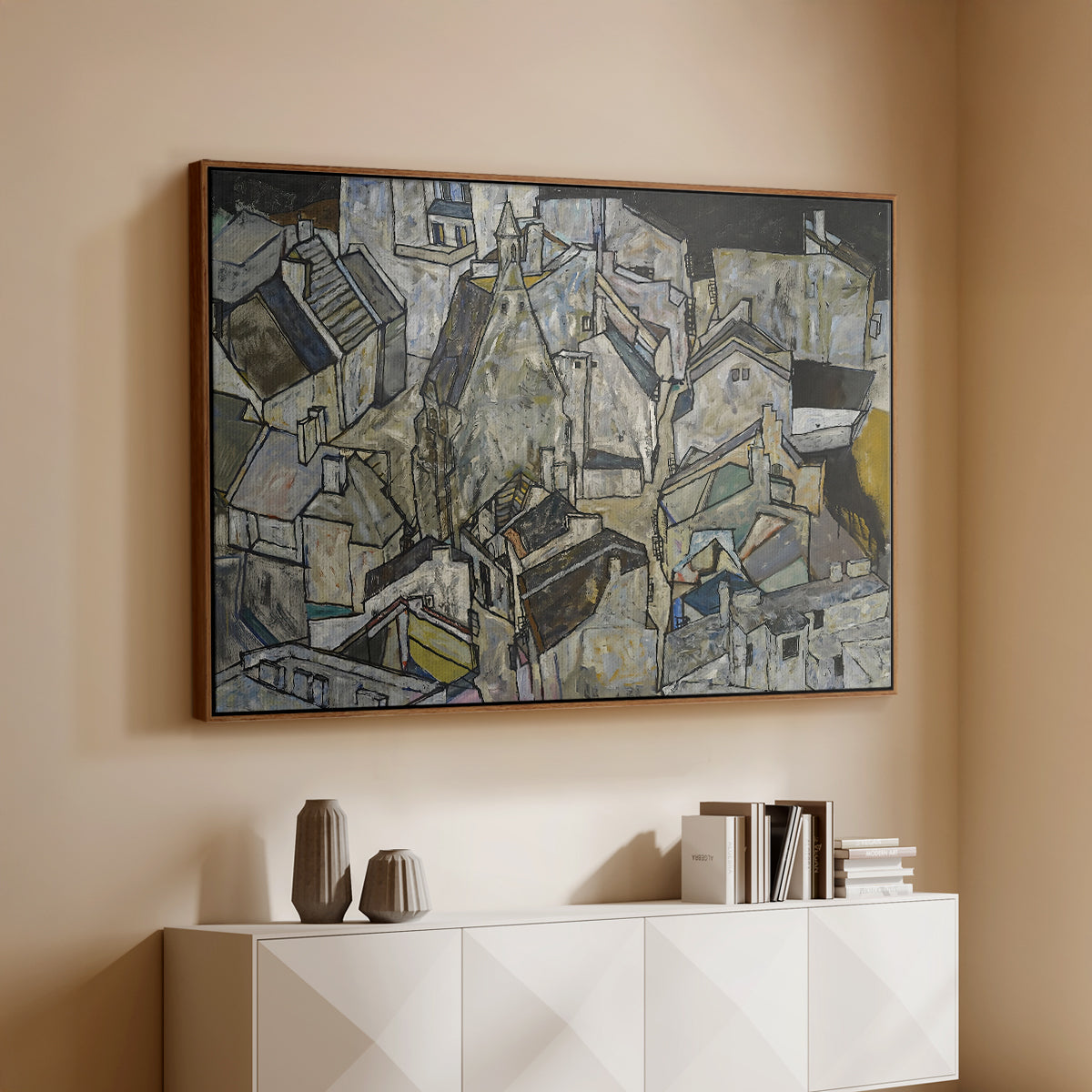 Walnut floater framed canvas of Mödling II, 1918 by Egon Schiele, featuring an expressionist cityscape with tightly packed buildings and bold lines above a console cabinet in a minimalist entryway.