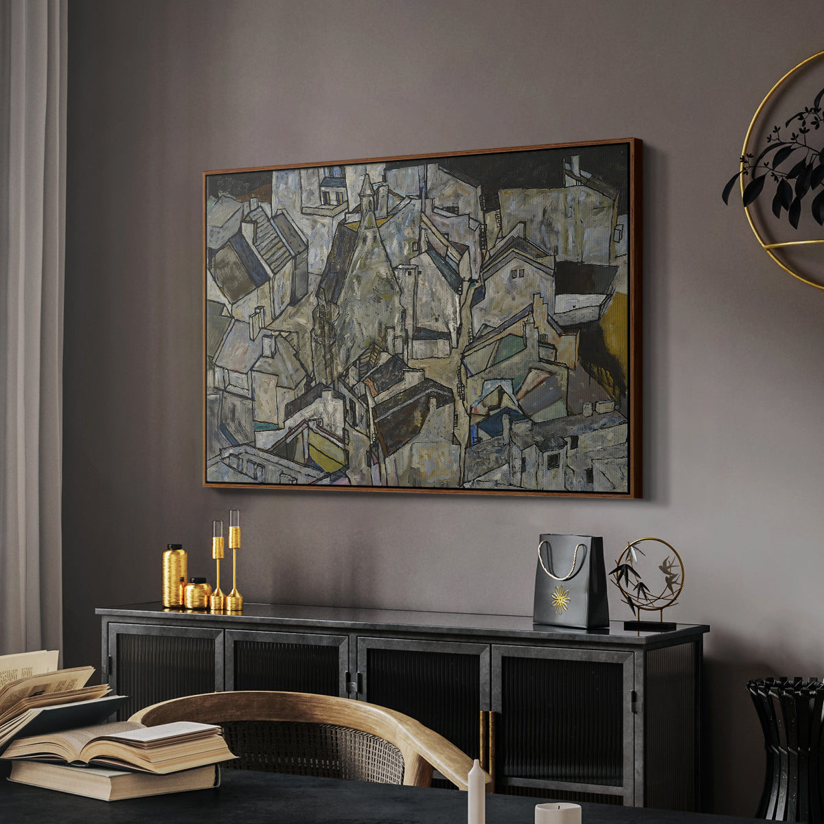Mödling II, 1918 by Egon Schiele in a walnut floater framed canvas featuring an abstracted town view with angular rooftops and fragmented forms, displayed above a desk in a dark home office interior.