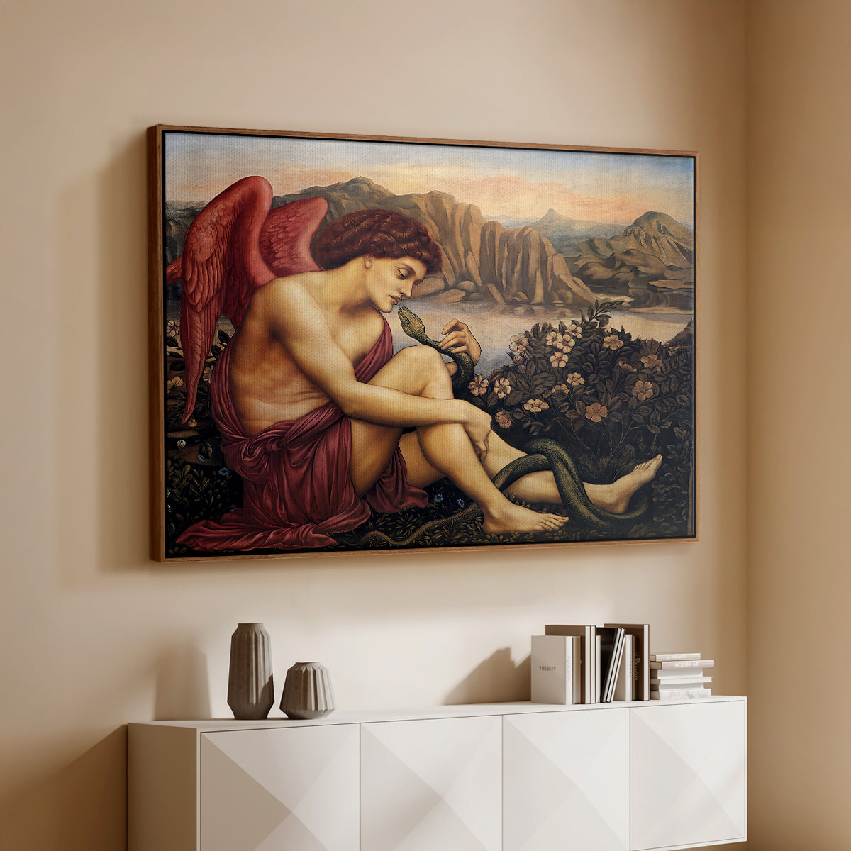 Walnut floater framed canvas of The Angel with the Serpent, c. 1870-1875 by Evelyn De Morgan, featuring a winged figure standing over serpent in allegorical composition above a console cabinet in a minimalist entryway.
