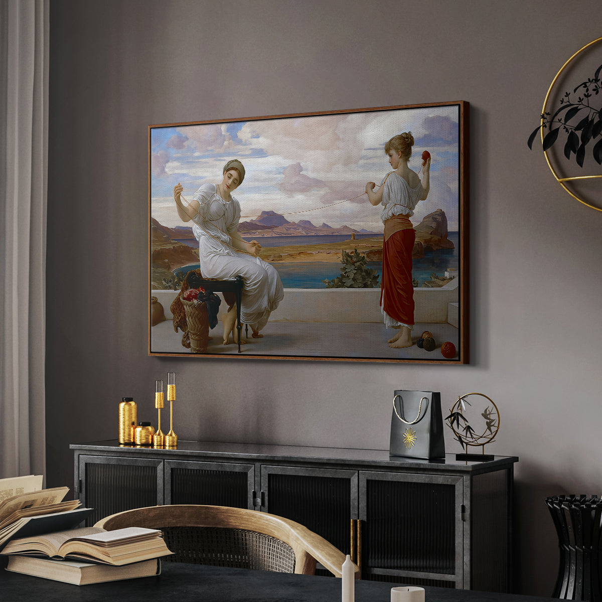 Winding the Skein, c. 1878 by Frederic Leighton in a walnut floater framed canvas featuring a classical scene of figures winding thread together, displayed above a desk in a dark home office interior.
