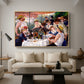 Luncheon of the Boating Party (Le Déjeuner des canotiers), 1880-1881 by Pierre-Auguste Renoir as a natural wood floater framed canvas featuring a group of elegantly dressed people dining together on a sunlit balcony overlooking the river, displayed above a sofa in a modern living room.