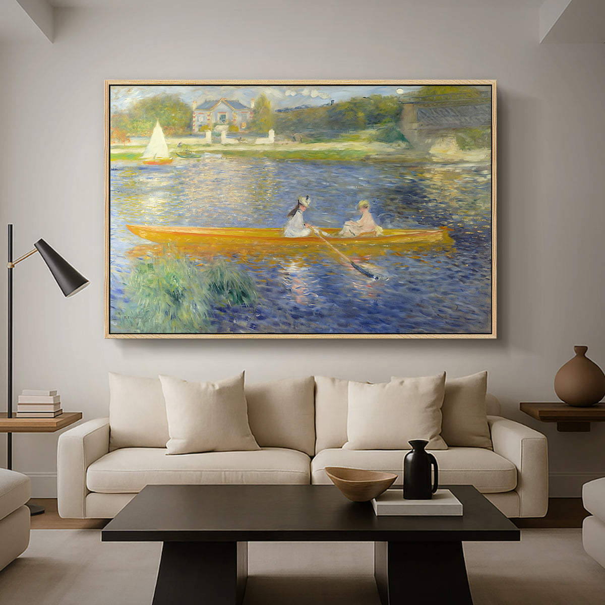 The Skiff (La Yole), 1875 by Pierre-Auguste Renoir as a natural wood floater framed canvas featuring two figures seated in a small boat drifting across calm water, displayed above a sofa in a modern living room.