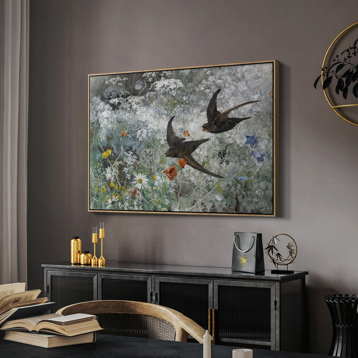 Common Swifts, 1886 by Bruno Liljefors in a natural wood floater framed canvas featuring a multiple birds flying together in natural outdoor scene, displayed above a desk in a dark home office interior.