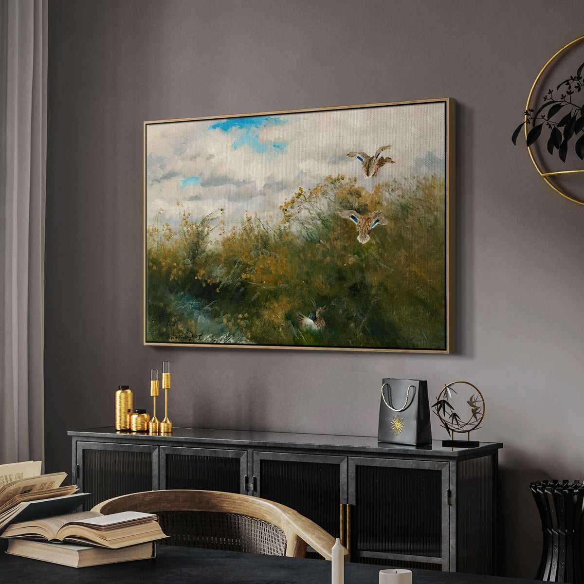 Wild Ducks (Grasänder), 1890 by Bruno Liljefors in a natural wood floater framed canvas featuring a group of ducks foraging in natural marsh setting, displayed above a desk in a dark home office interior.