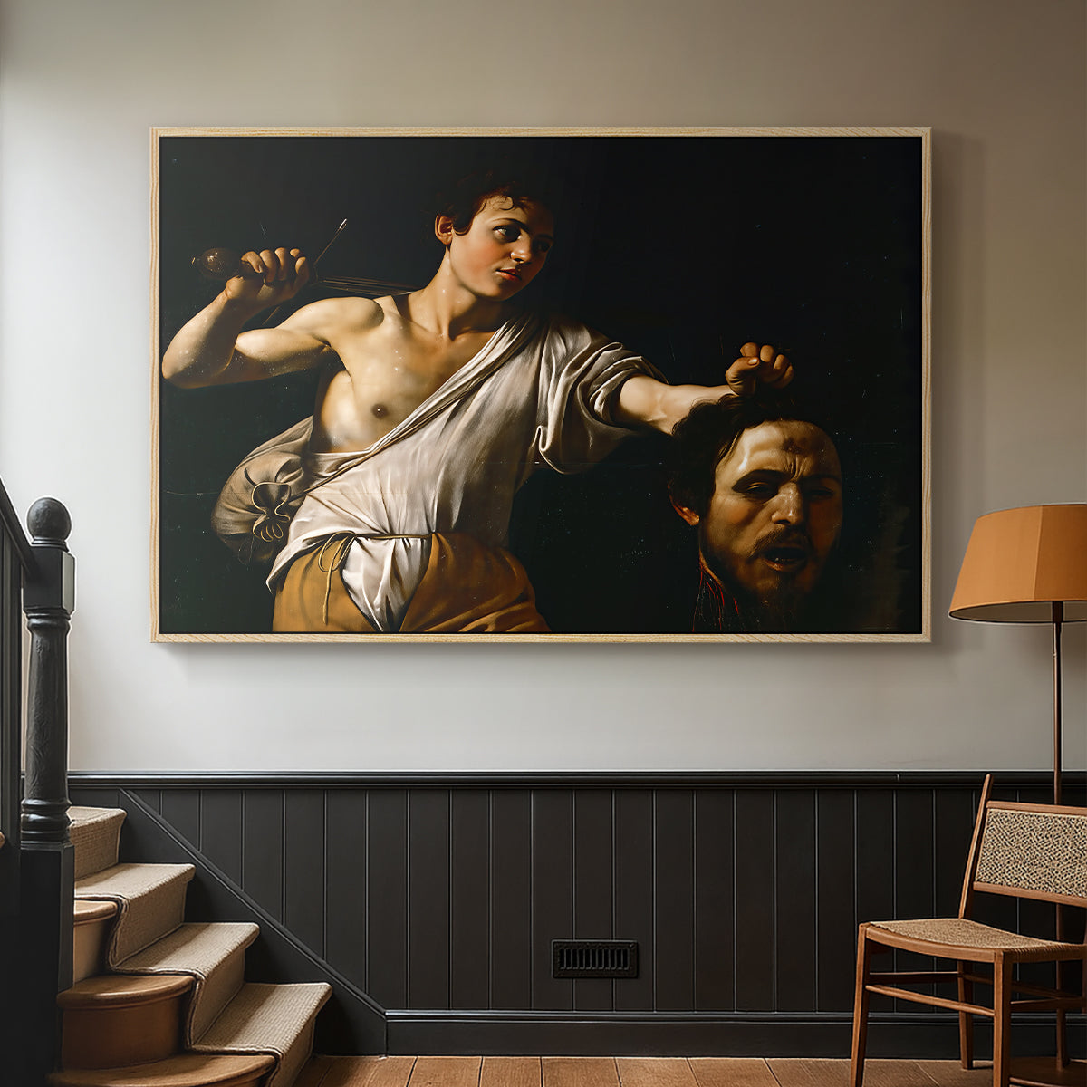 Natural wood floater framed canvas featuring an intense religious scene with figure emerging from darkness holding trophy, displayed in a hallway near a staircase.