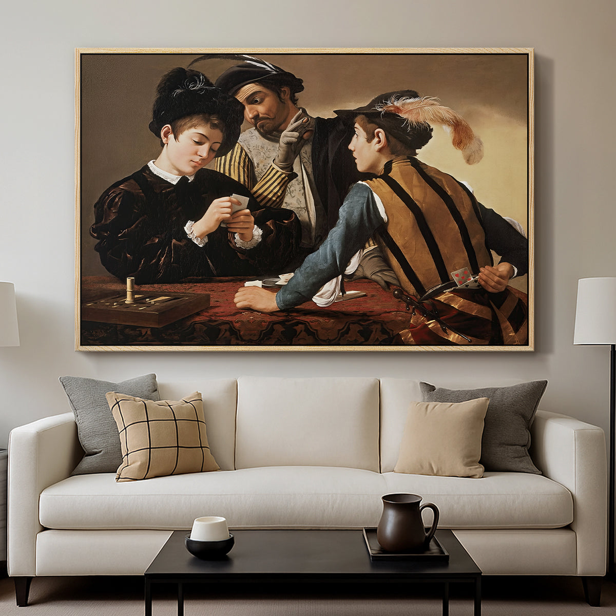 The Cardsharps, c. 1594 by Caravaggio displayed in a natural wood floater framed canvas above a sofa in a clean living room.