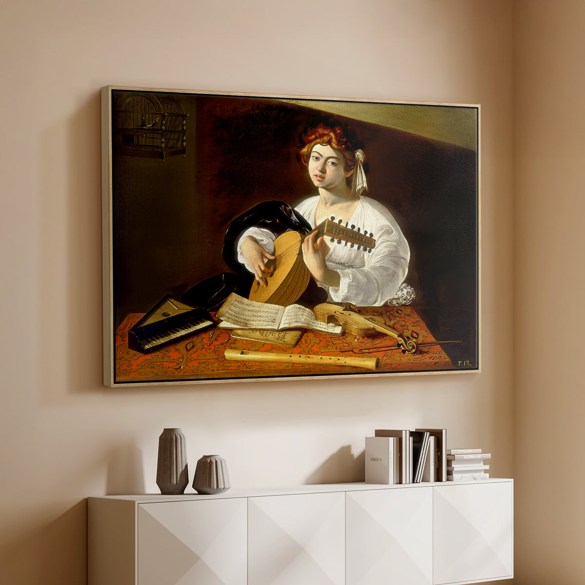Natural wood floater framed canvas of The Lute Player (Wildenstein Version), c. 1596 by Caravaggio, featuring a musician seated with lute and musical instruments on table above a console cabinet in a minimalist entryway.