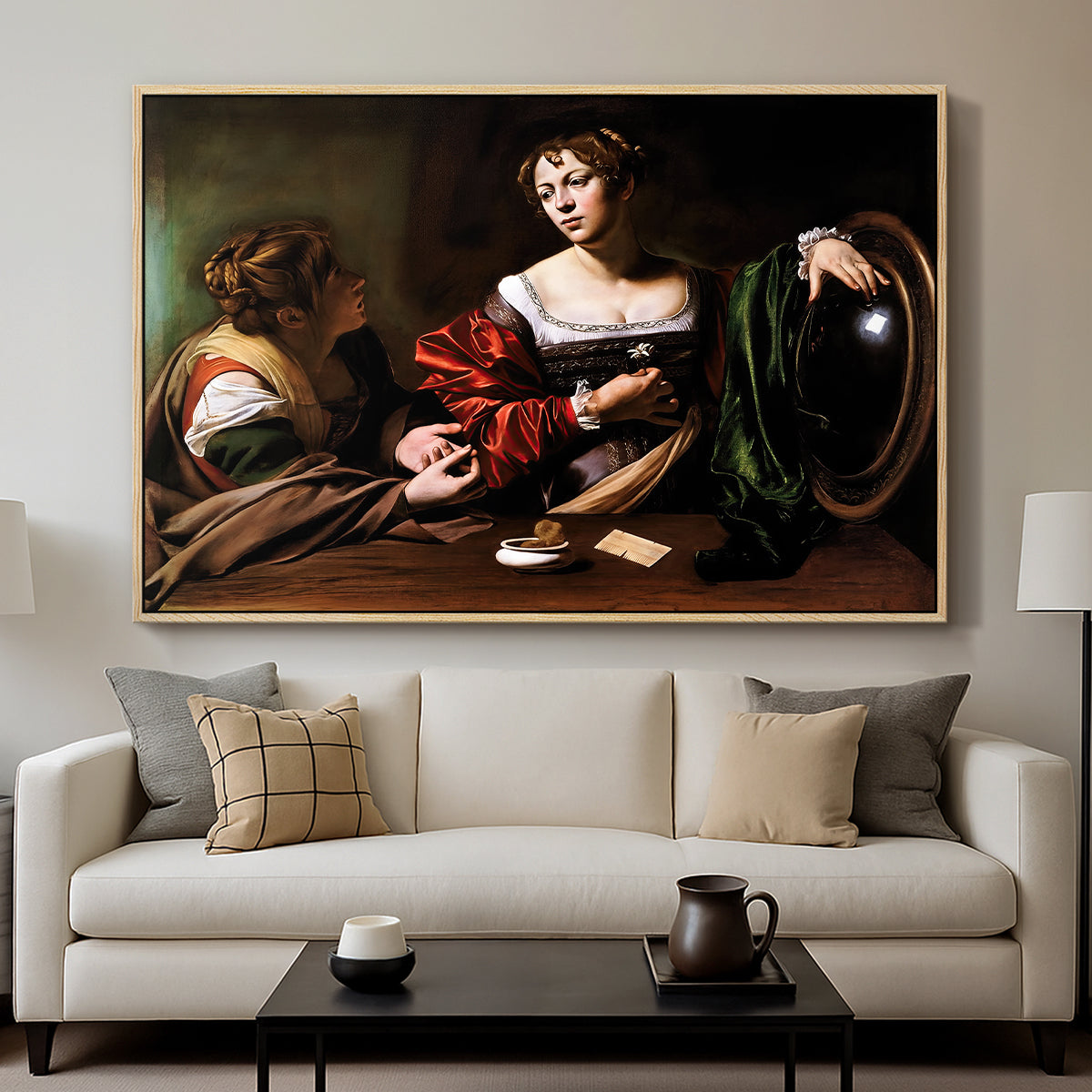 Martha and Mary Magdalene, c. 1598 by Caravaggio displayed in a natural wood floater framed canvas above a sofa in a clean living room.