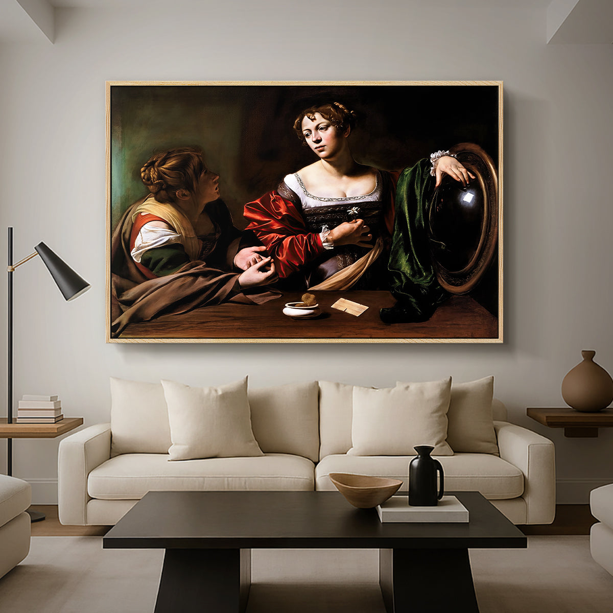 Martha and Mary Magdalene, c. 1598 by Caravaggio as a natural wood floater framed canvas featuring a two women seated together in conversation with symbolic objects on table, displayed above a sofa in a modern living room.