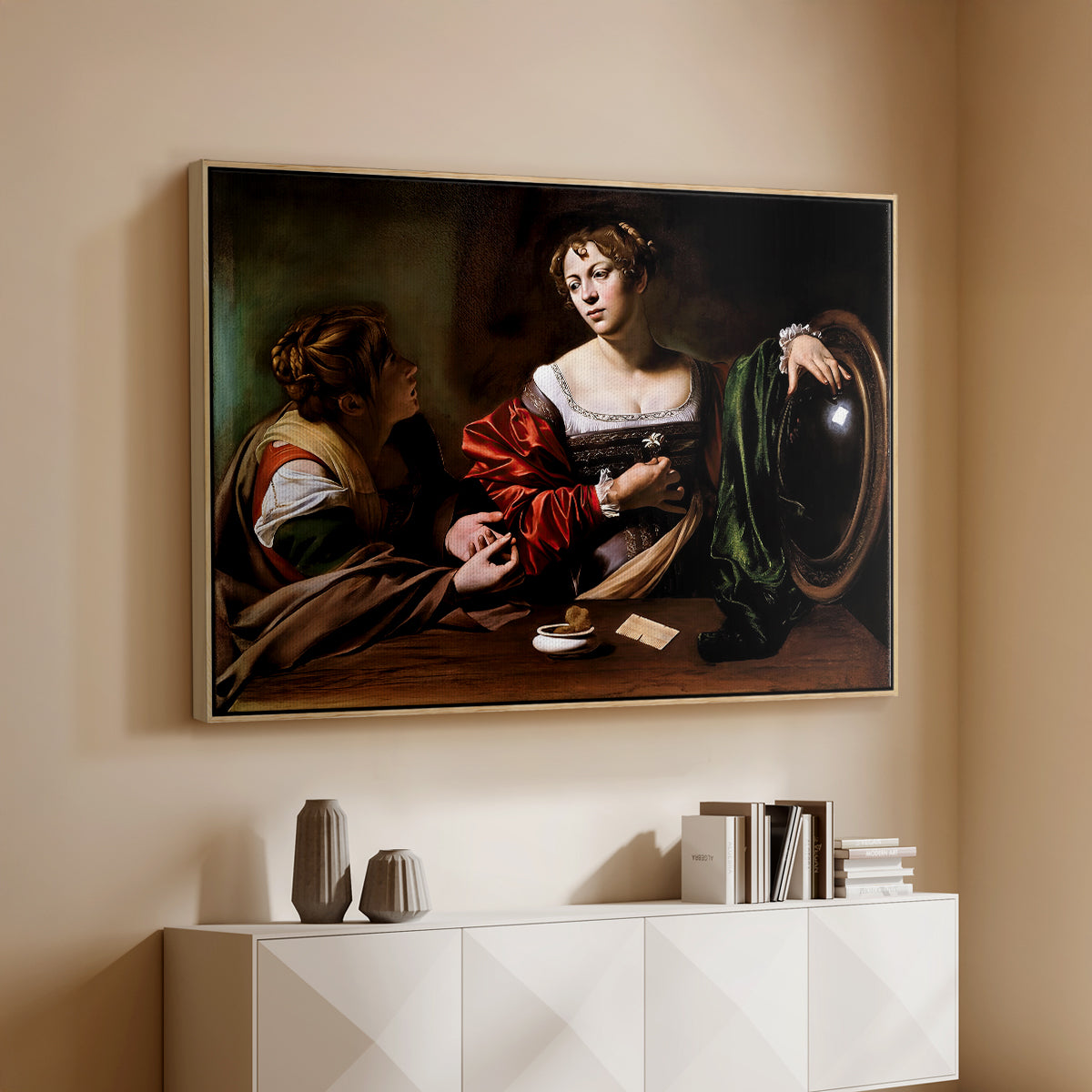 Natural wood floater framed canvas of Martha and Mary Magdalene, c. 1598 by Caravaggio, featuring a biblical scene of Martha speaking to Mary Magdalene indoors above a console cabinet in a minimalist entryway.