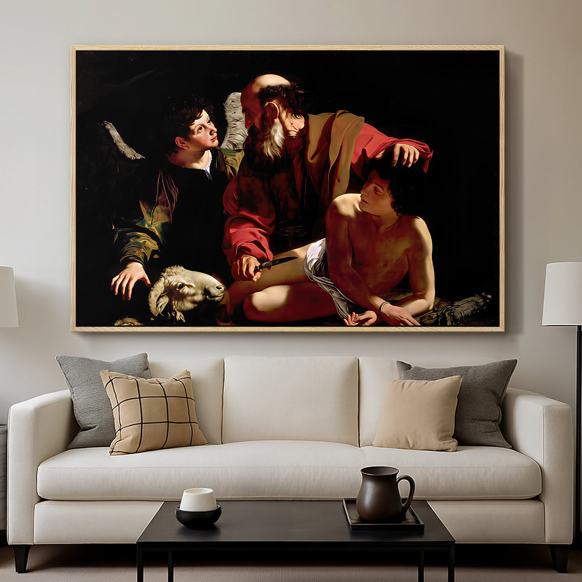 The Sacrifice of Isaac (Uffizi Version), c. 1603 by Caravaggio displayed in a natural wood floater framed canvas above a sofa in a clean living room.