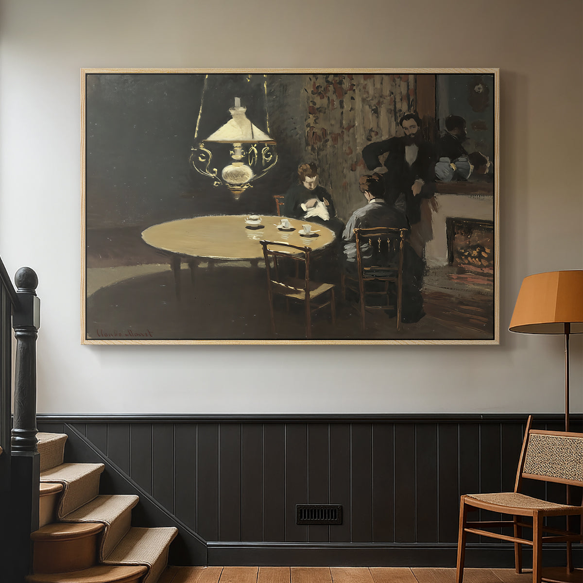 Natural wood floater framed canvas featuring an intimate indoor scene with figure and table in low lighting, displayed in a hallway near a staircase.