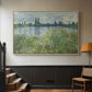 Natural wood floater framed canvas featuring a natural landscape with calm water and soft foliage, displayed in a hallway near a staircase.